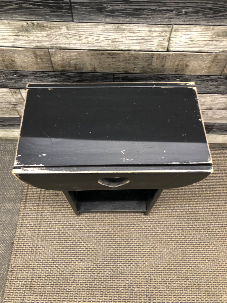 DISTRESSED HEART CUT-OUT BLACK SIDE TABLE.