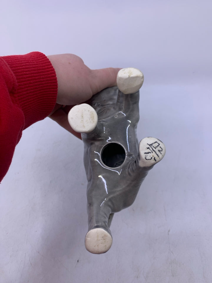 LIGHT GREY WALKING ELEPHANT W/ TRUNK UP.