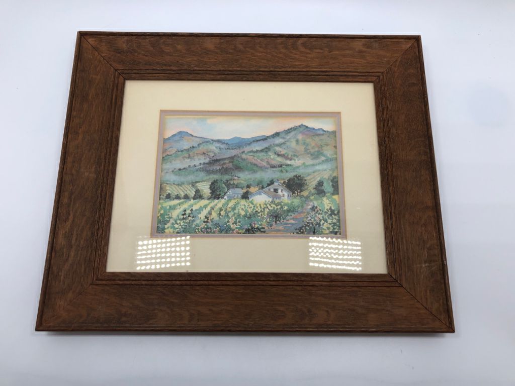 WATERCOLOR COUNTRYSIDE PRINT IN WOOD FRAME.