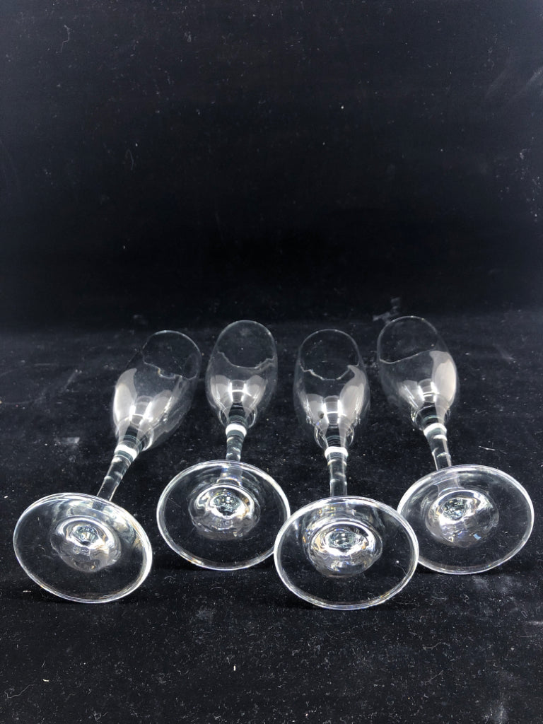 4 CLEAR CHAMPAGNE GLASSES.