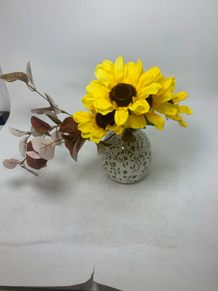 WHITE/GREEN VASE W/ FAUX YELLOW FLOWERS.