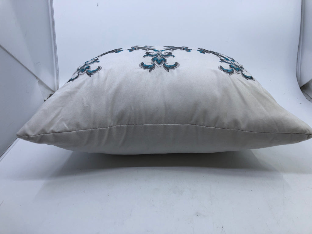 GREY AND TEAL RECTANGLE PILLOW.