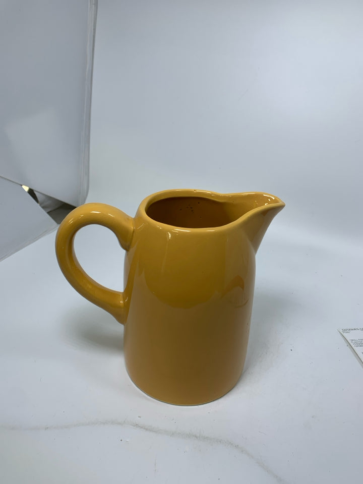 MUSTARD YELLOW PITCHER.