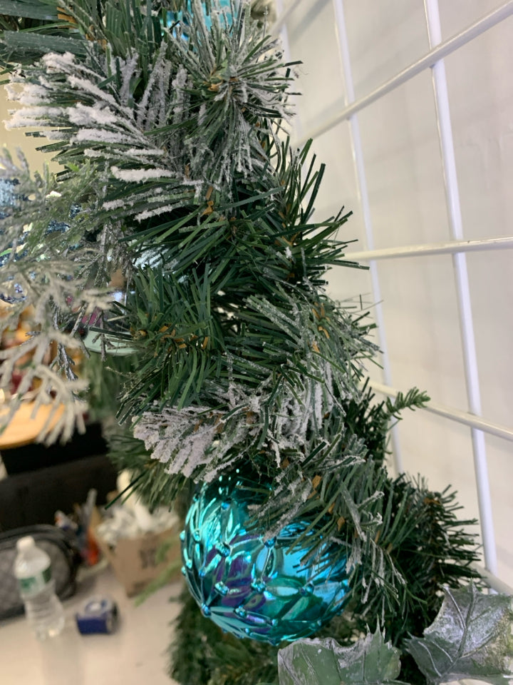 FROSTED GARLAND W BLUE AND SILVER BULBS.