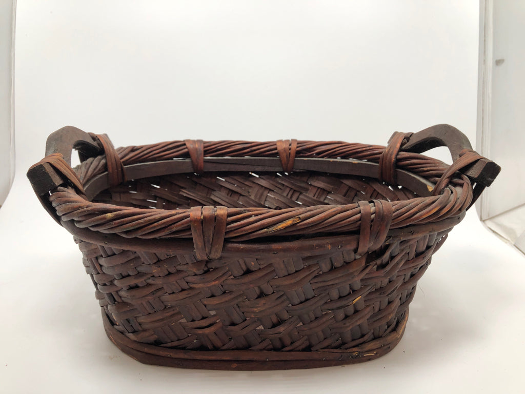 DARK CHERRY WOOD WOVEN BASKET W/WOOD HANDLES.
