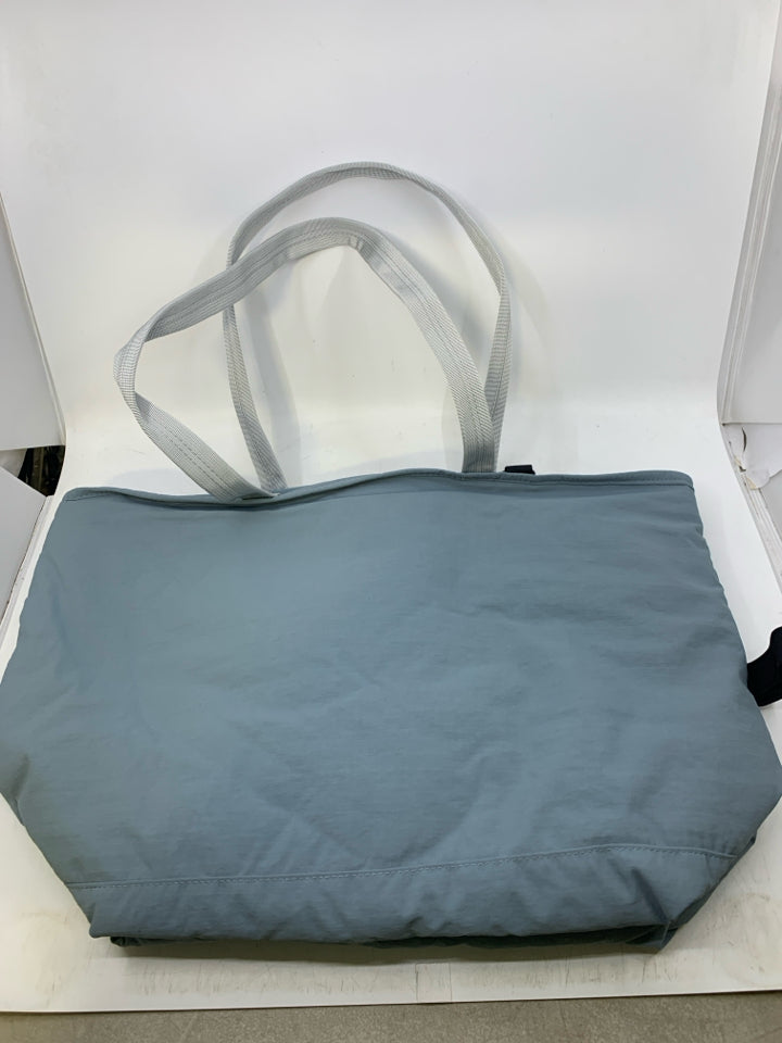 NEW PALE BLUE COOLER BAG W/ GREY HANDLES.