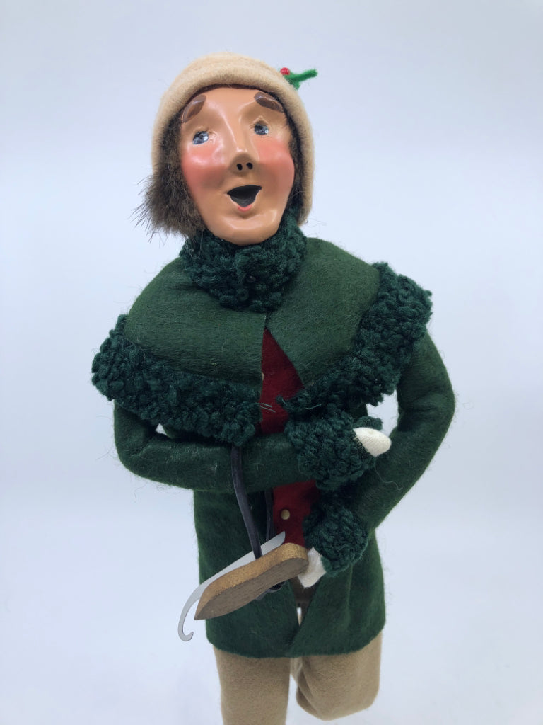 MAN IN GREEN COAT W/ SKATES "THE SKATERS" 1991 BRYERS CHOICE.