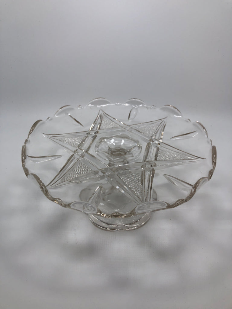 CLEAR GLASS CAKE STAND W/STAR ETCHING.