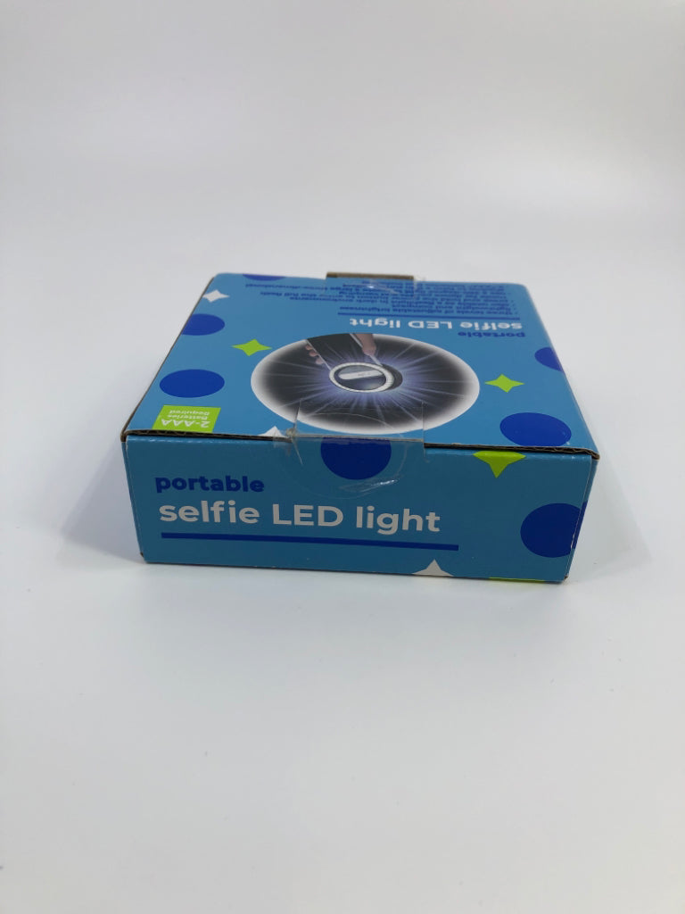 NIB PORTABLE LED SELFIE LIGHT.