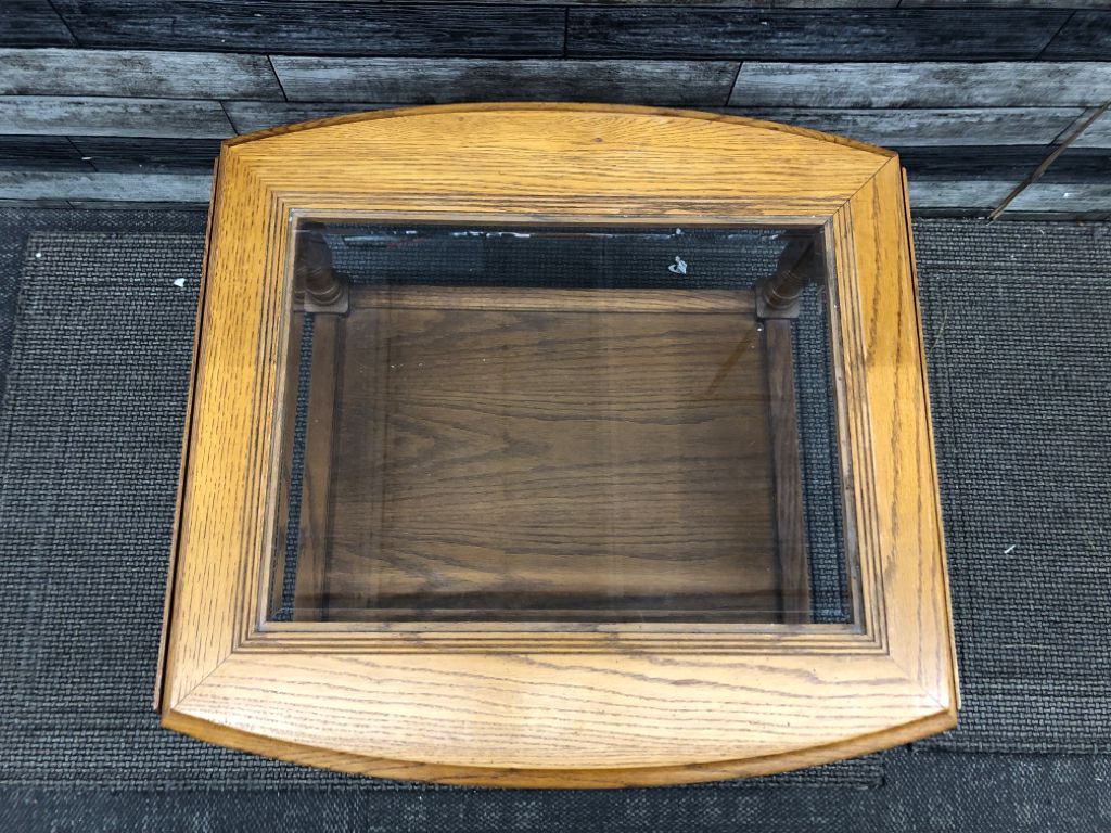 OAK WOOD COFFEE TABLE W/ GLASS TOP/FOLDING SIDES.