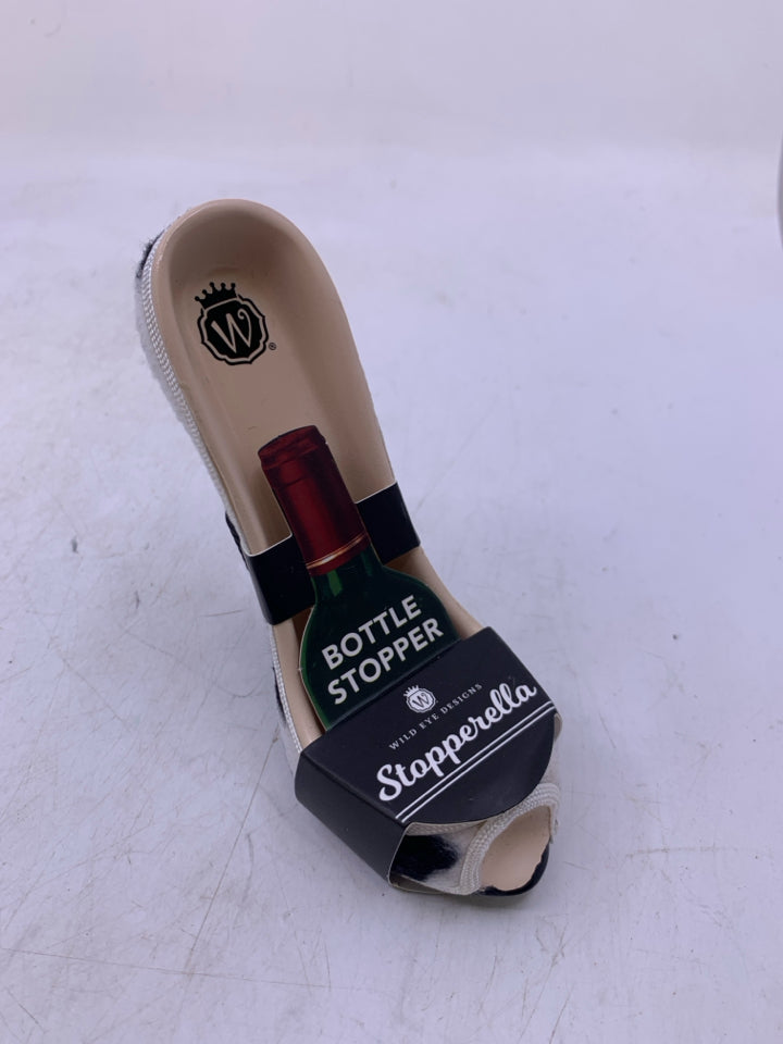 RESIN HIGH HEEL WHINE STOPPER.