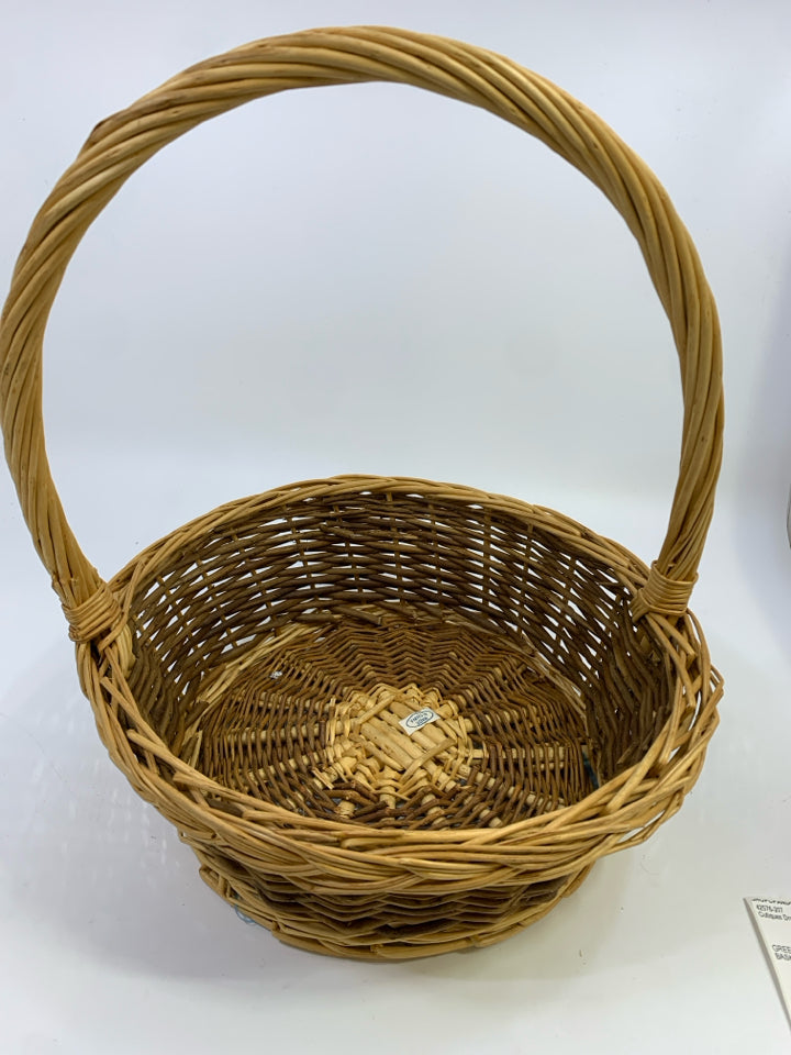 WOVEN CIRCULAR 2-TONED BASKET W/TALL HANDLE.