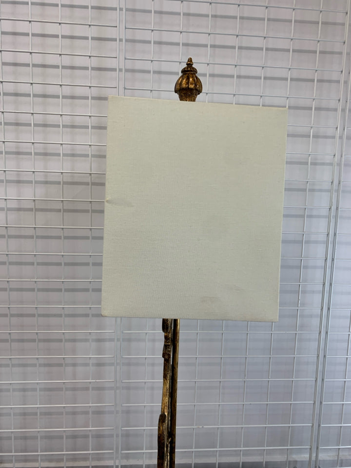 GOLD SCROLL METAL BASE LAMP W/SQUARE WHITE SHADE.