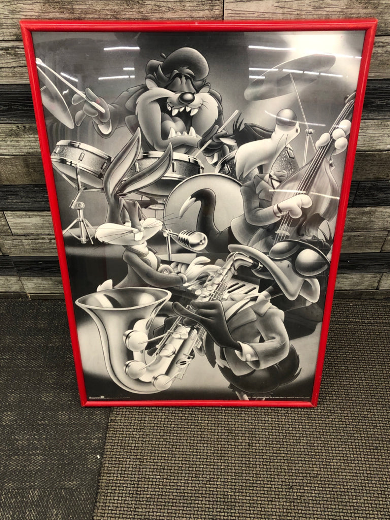 VTG BLACK & WHITE CARTOON PRINT IN RED FRAME.