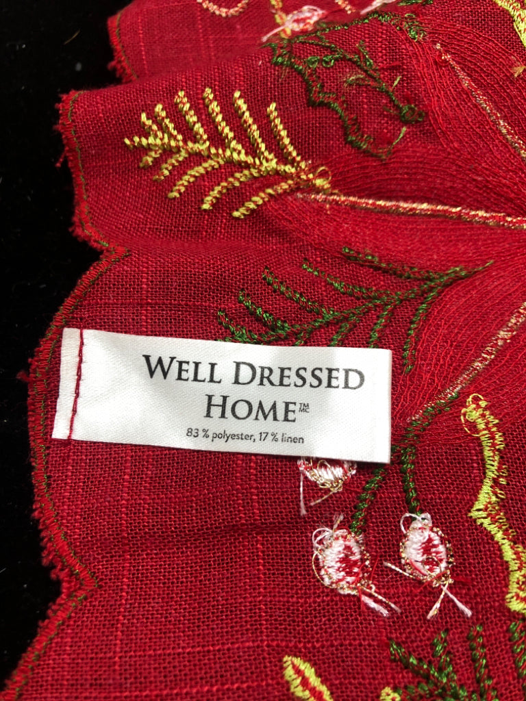 RED TABLE RUNNER W/WHITE POINSETTIA.