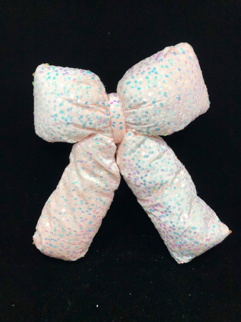 PINK PLUSH BOW W/ IRIDESCENT SEQUINS.