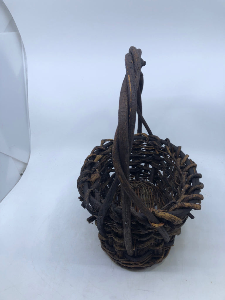 DARK STURDY STICK BASKET BURNT LOOK.