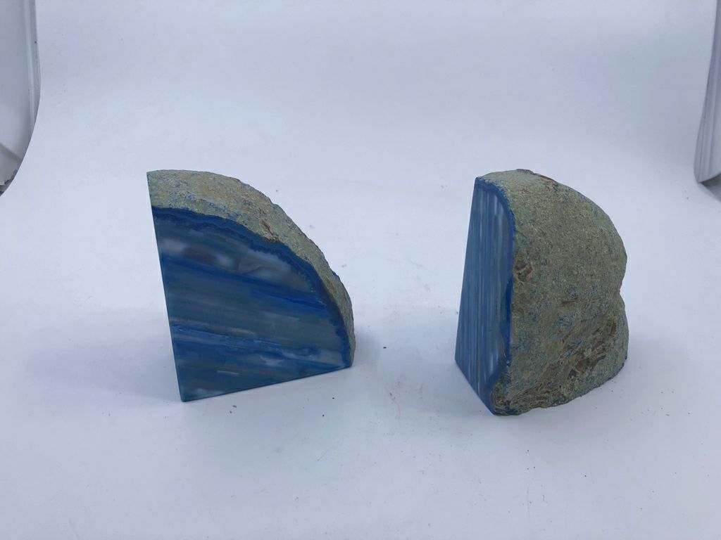 2 BLUE CUT ROCK BOOKENDS.