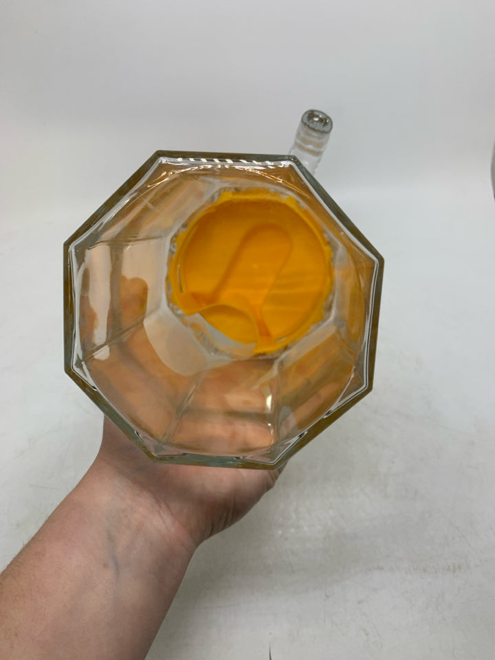 GLASS OCTAGON SHAPE SHAPE PITCHER W/ YELLOW LID.