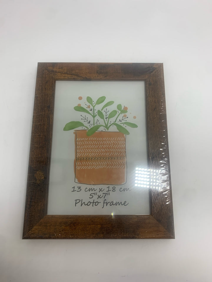 NIP WOODEN RUSTIC PICTURE FRAME.