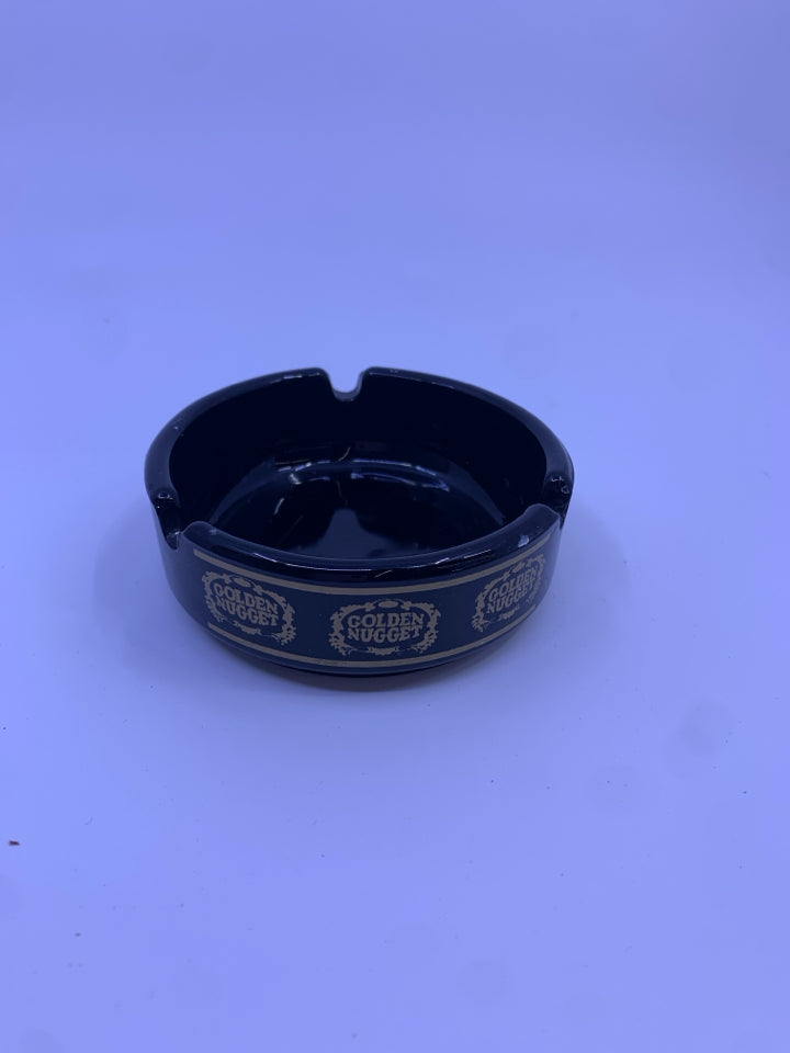 VTG GOLDEN NUGGET BLACK GLASS ASHTRAY.