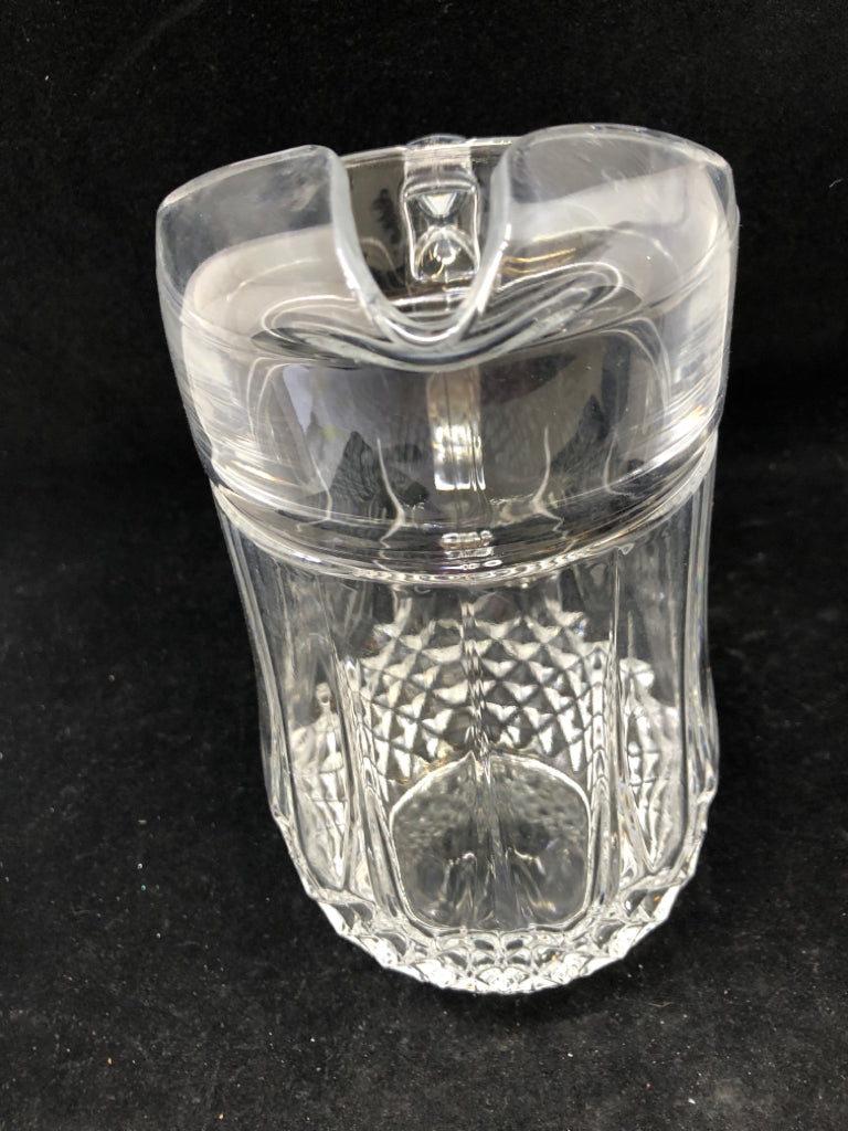 GLASS PITCHER W HANDLE.