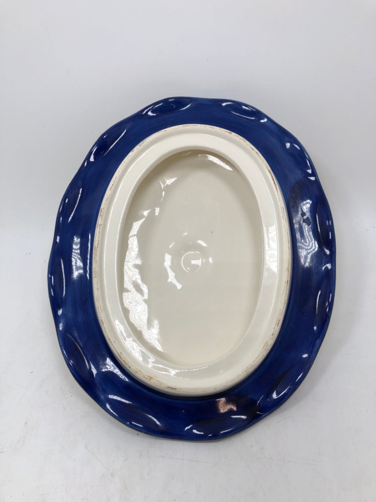 YELLOW STONEWARE BEAN POT W/BLUE RUFFLE EDGE.