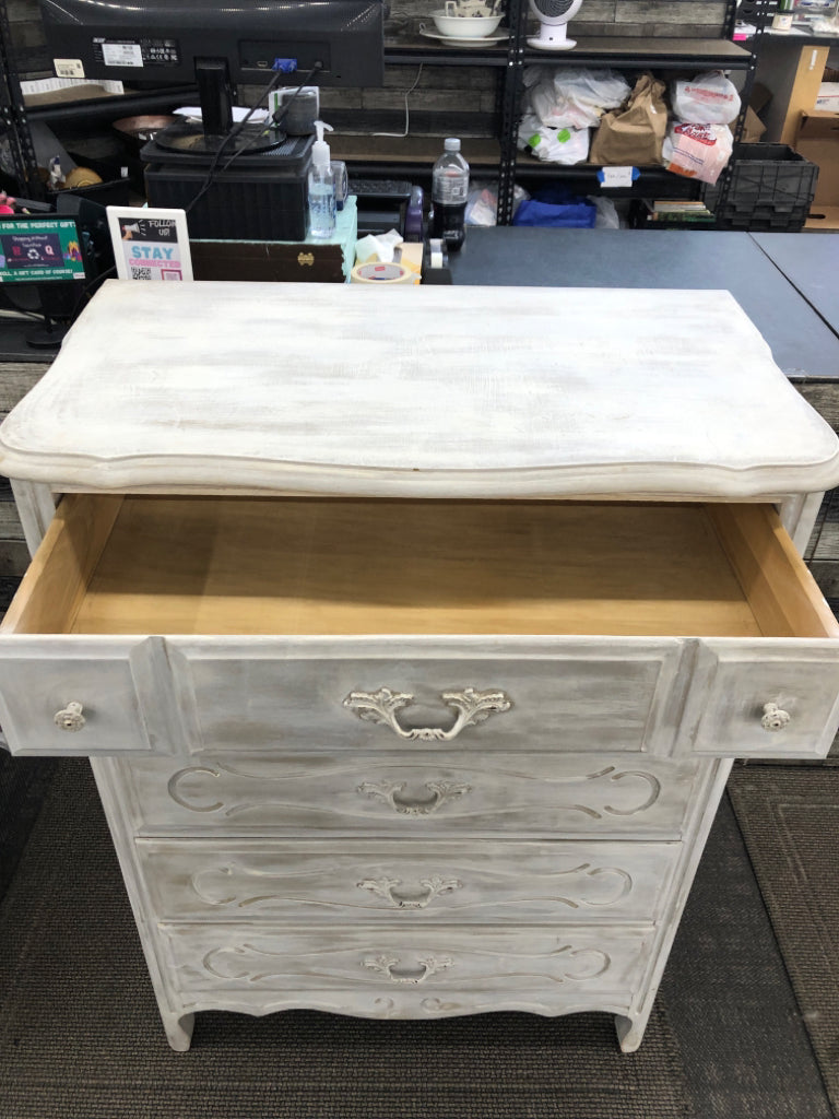 DISTRESSED WHITE WOODEN DRESSER.