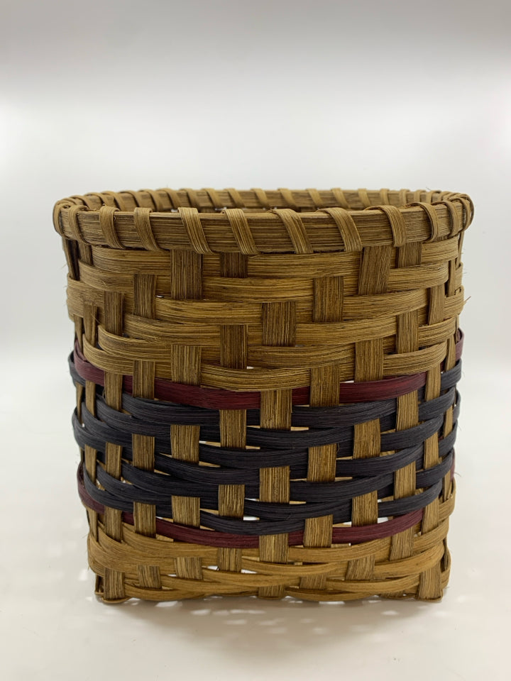 HANDMADE ROUND WOVEN SQUARE BOTTOM BASKET W/PURPLE AND BLUE LINES.
