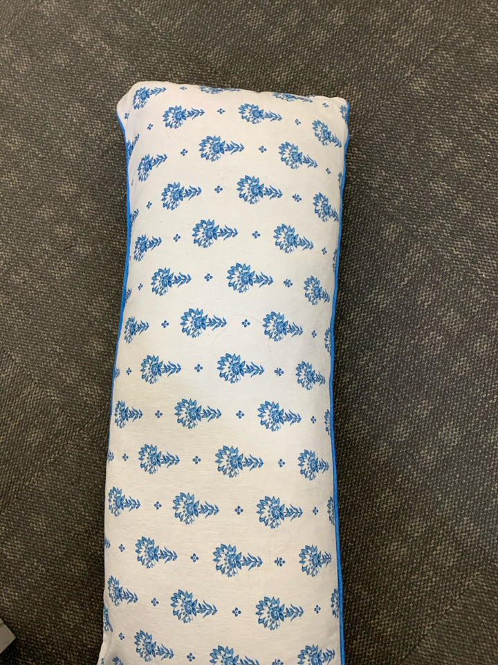 LONG BLUE FLORAL PILLOW W/YELLOW ACCENTS.