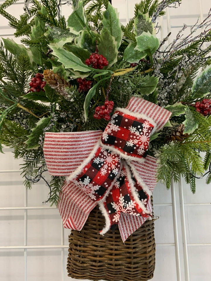 FAUX HOLLY AND GLITTER BRANCHES IN BASKET W/BOW.