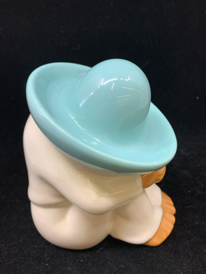 SLEEPING MAN WHITE W/TEAL SOMBRERO.