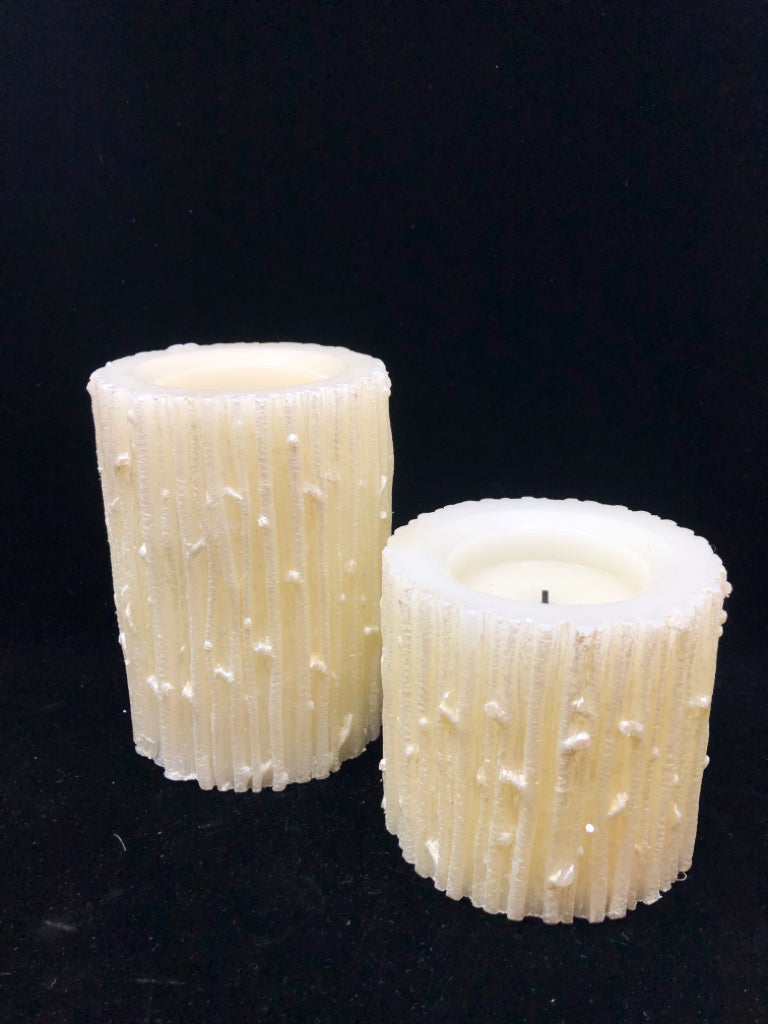 2 BIRCH FLAMELESS CANDLES.