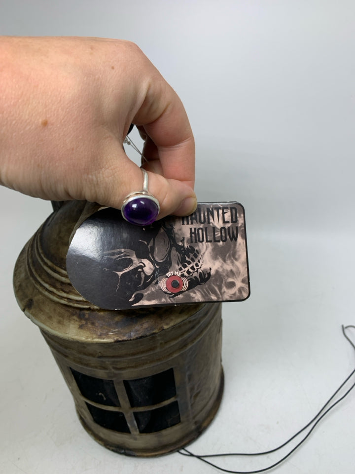 NWT PLASTIC ANIMATRONIC HAUNTED LANTERN NEEDS BATTERIES.