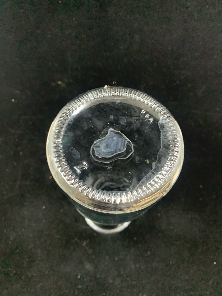 CARAFE W/EMBOSSED FLOWER AND PLASTIC LID.