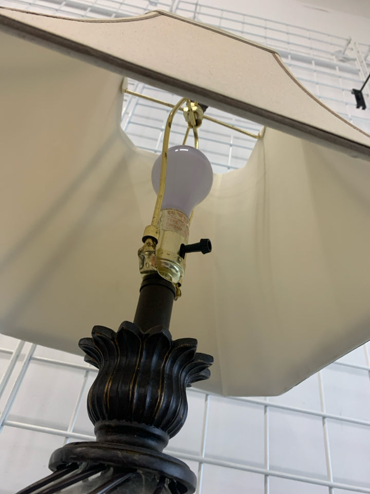 GLASS BALL AND GREY METAL BASE LAMP W/TAN SHADE.