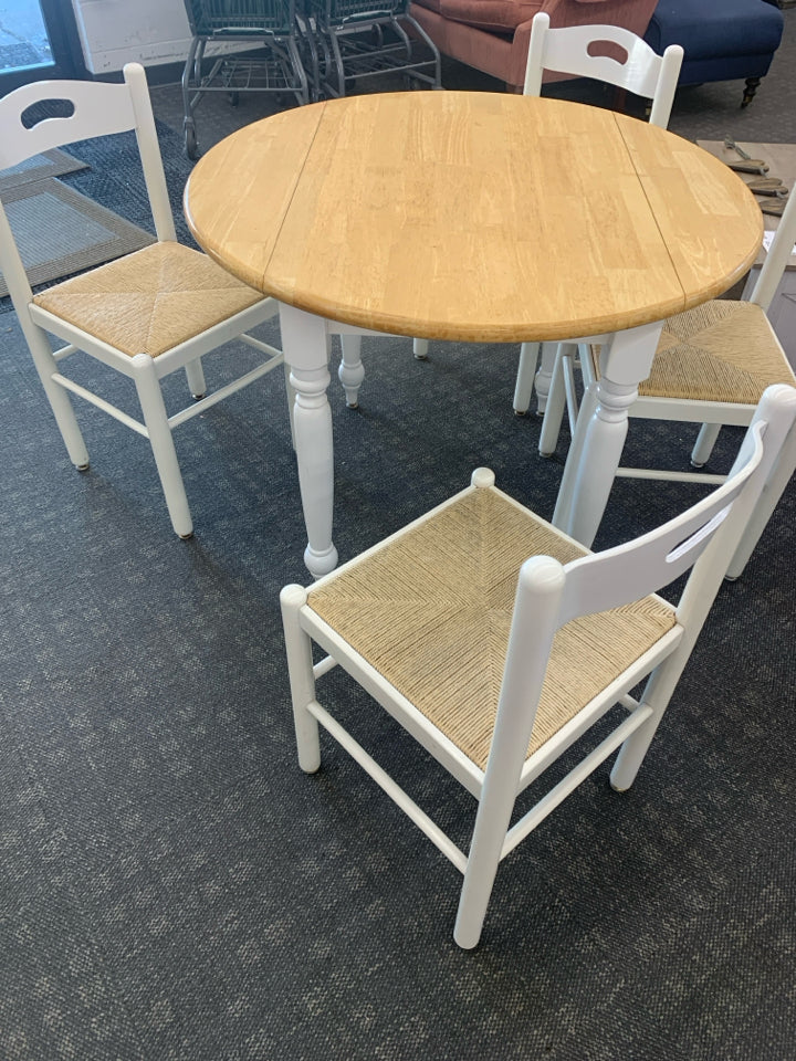 ROUND WHITE DINETTE BLONDE WOOD TOP W/ FOLDING SIDES AND 4 WHITE WICKER BOTTOM C