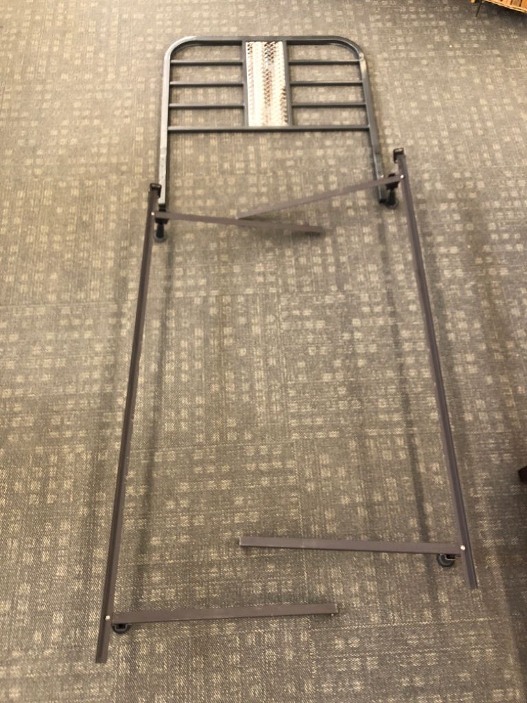 TWIN BLACK/SILVER METAL HEADBOARD W/METAL FRAME.