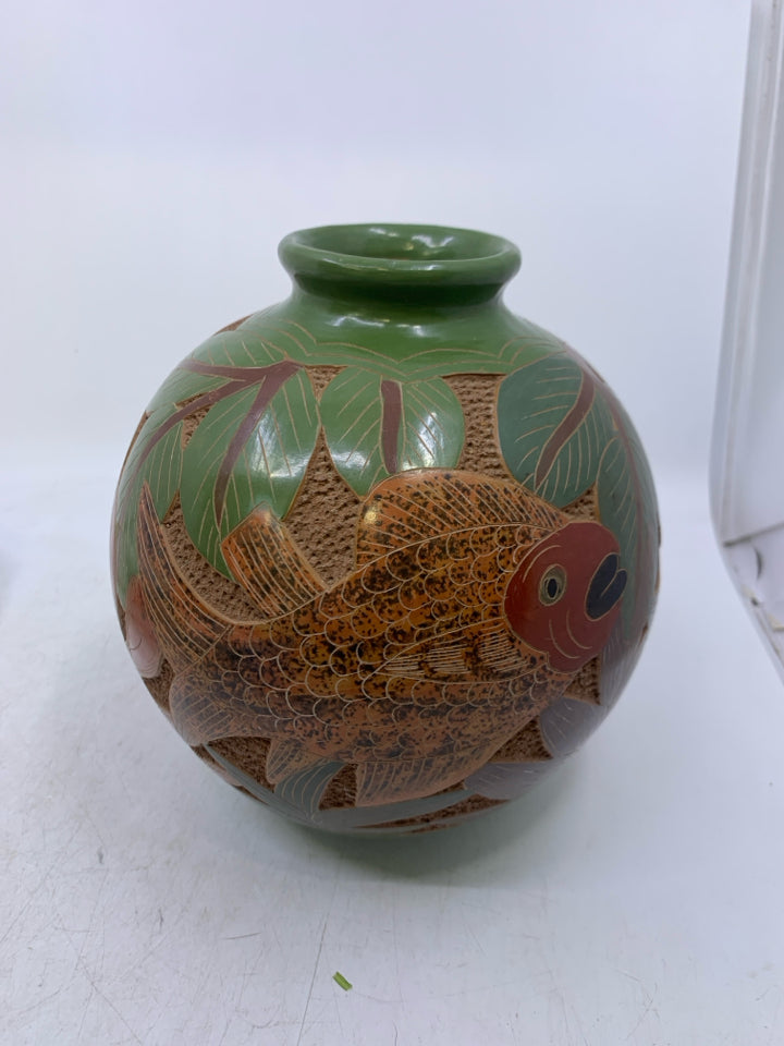 GREEN/BLUE LEAVES W/ CARVED FISH CIRCLE VASE.