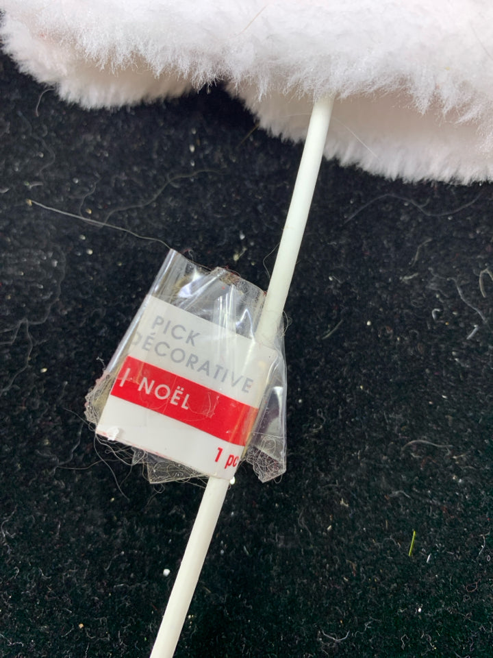 SANTA COAT ON A STICK.