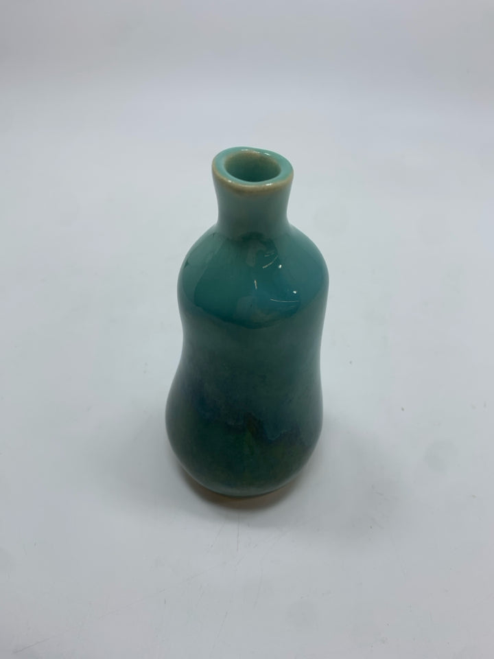 LT BLUE GLAZED BUD VASE.