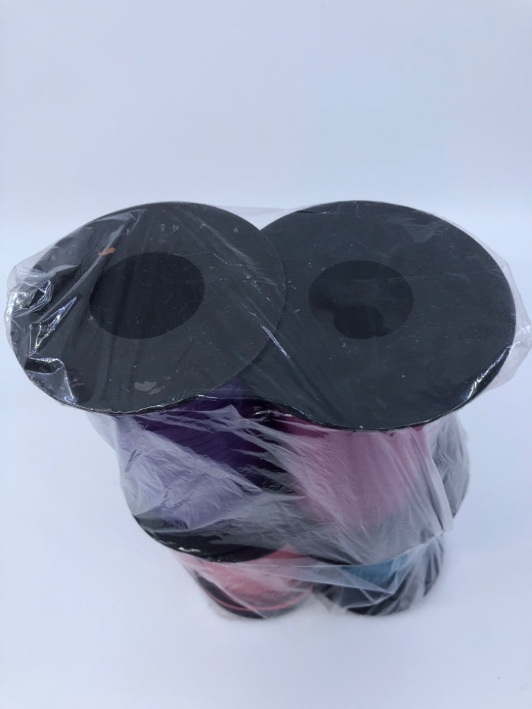 4 SPOOLS OF RIBBON PURPLE,PINK,BLUE,RED IN BAG.