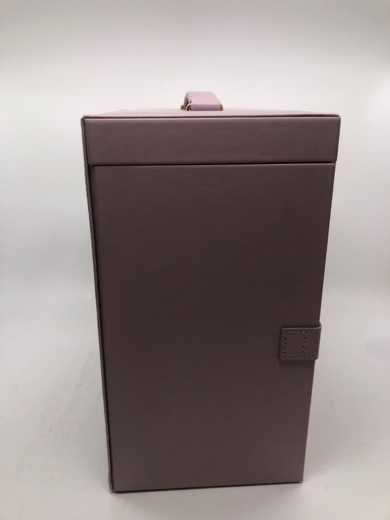 4 DRAWER PURPLE FAUX LEATHER JEWELRY ORGANIZER W/FLIP TOP.
