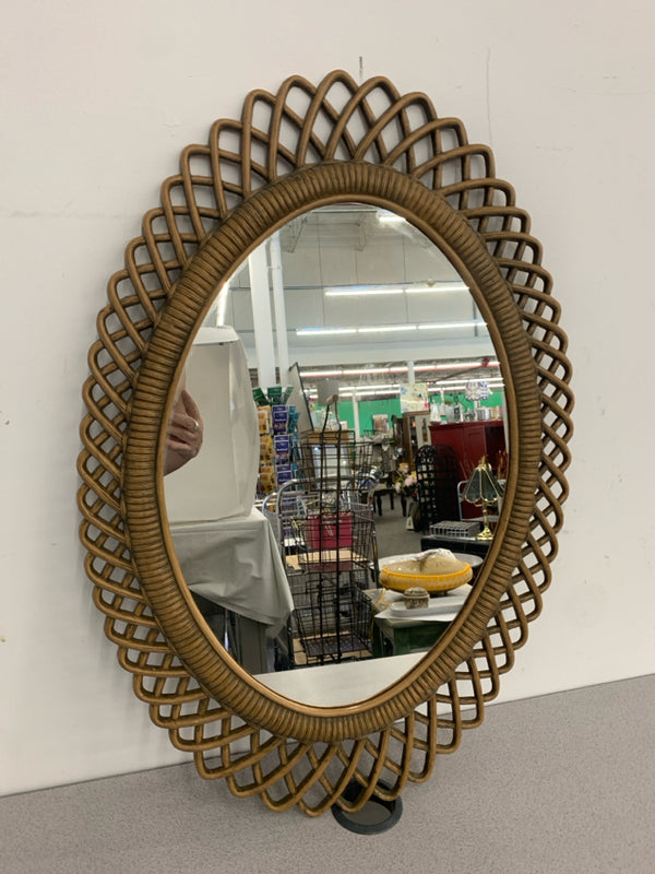 SQUIGGLY BROWN OVAL MIRROR.
