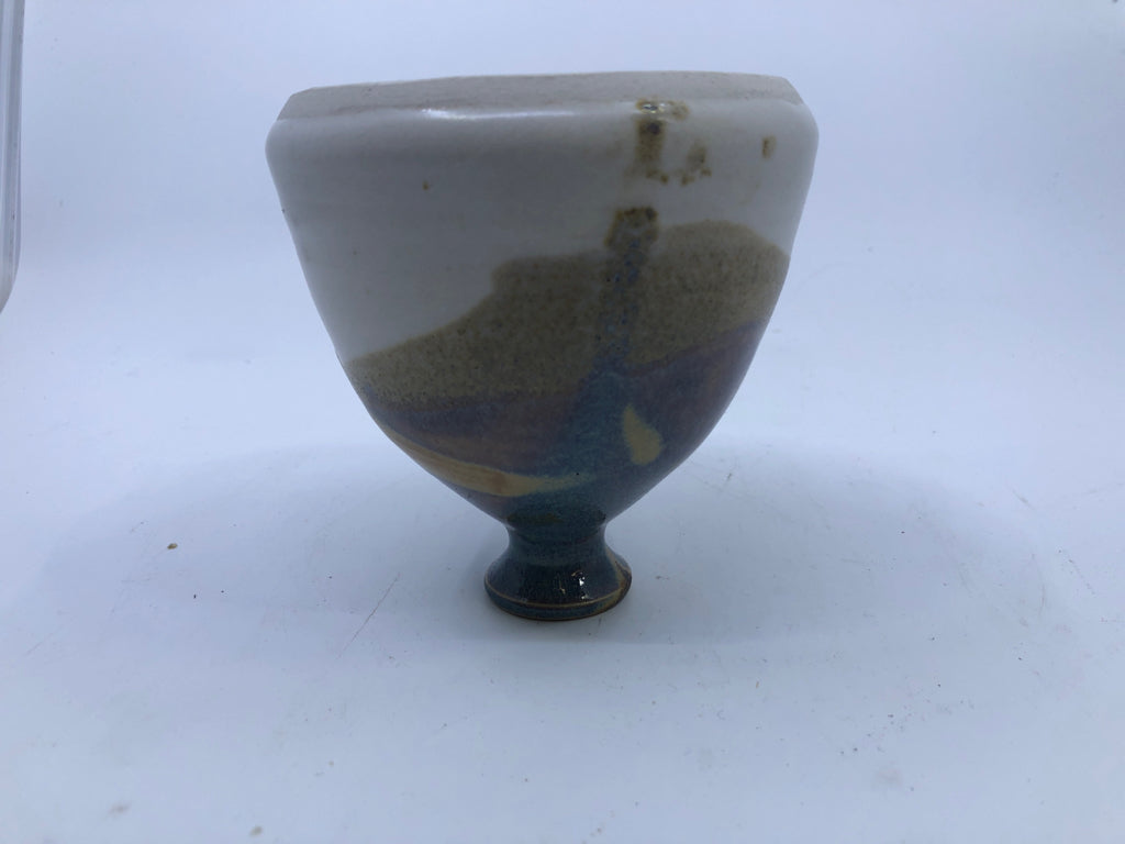 CREAM BOTTOM W/ BLUE,PURPLE,TAN TOP POTTERY VASE.