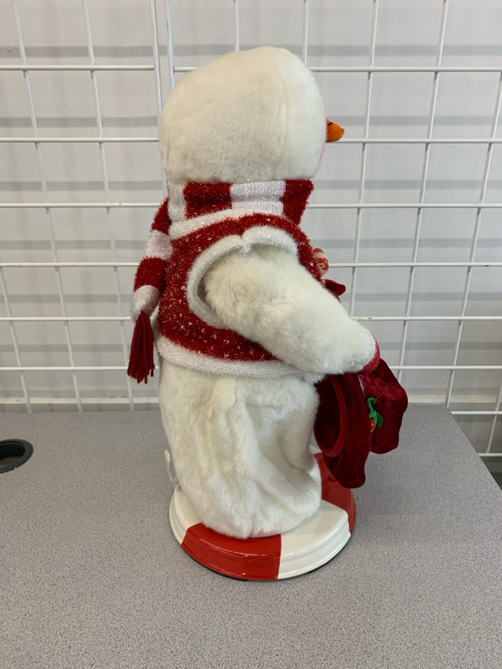 TWIRLING MUSICAL SNOWMAN.
