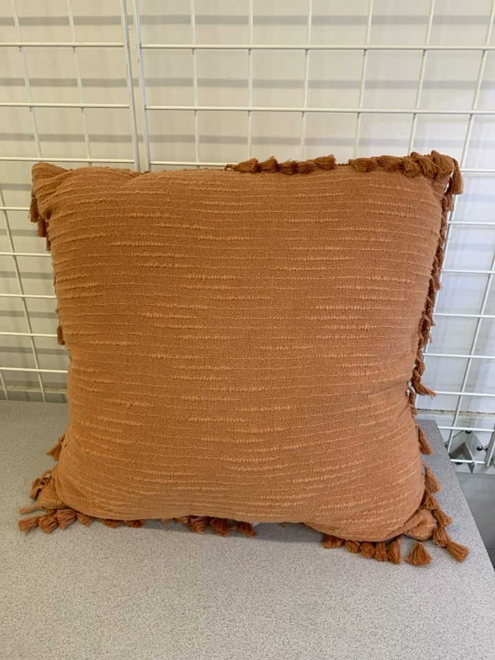 PINK BOHO PILLOW W/TASSELS.