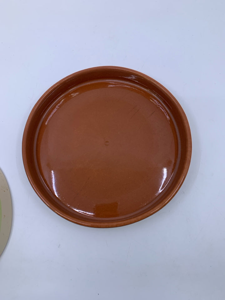 TERRA COTTA TORTILLA WARMER W/ PEPPERS ON IT.