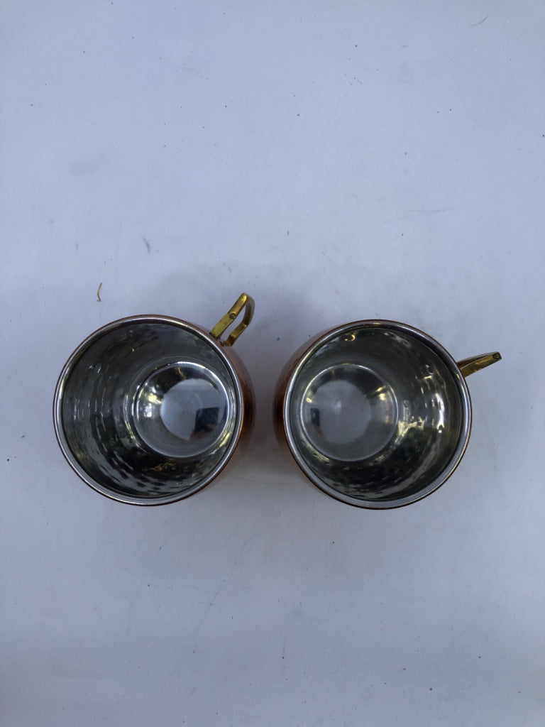 2 COPPER HAMMERED MUGS.