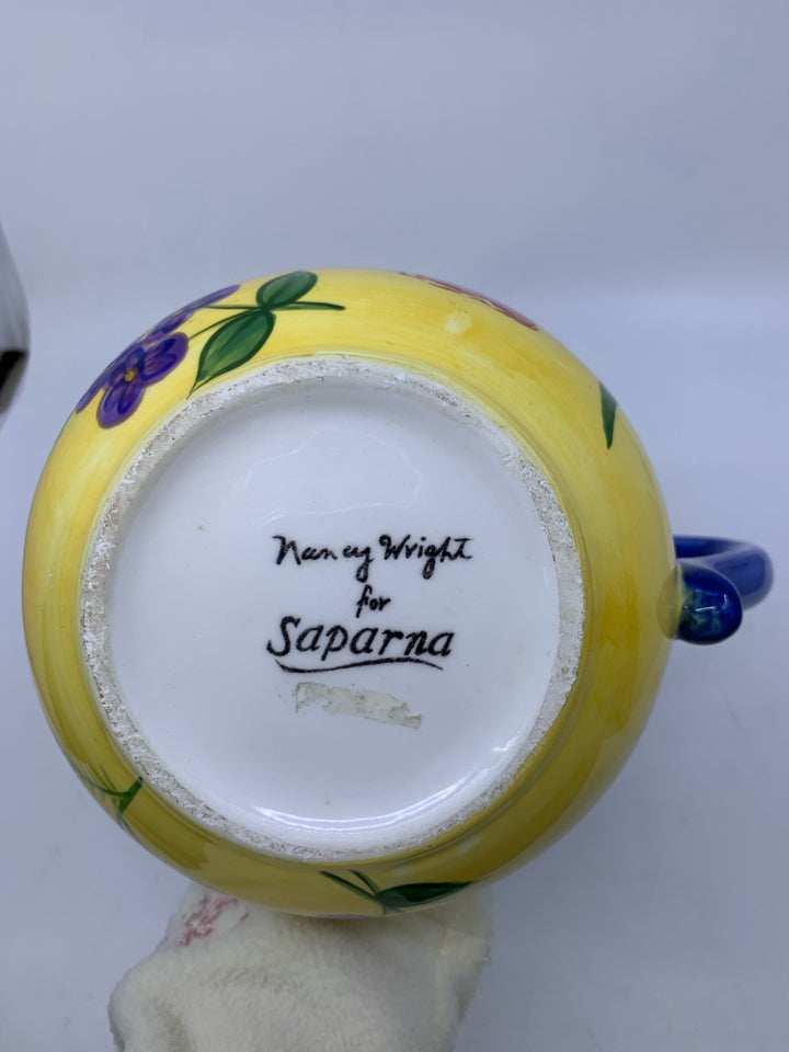 FLORAL BLUE HANDLE CERAMIC PITCHER.